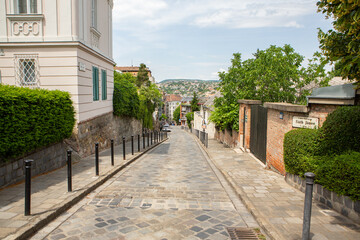 Obraz premium Very beautiful and colorful street in Budapest, the capital of Hungary. Street life in European city.