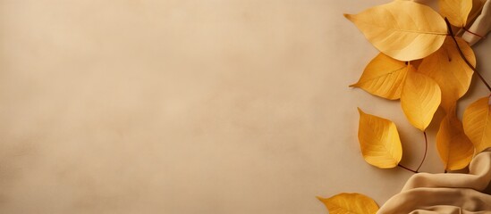 Autumn background Yellow leaves on a beige suede free space for text. copy space available