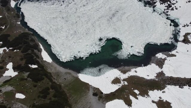 Top view of Drachen lake next to the Coburger Hut at the Alps mountains in Austria