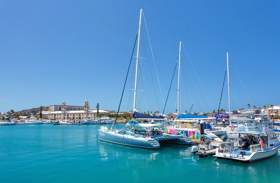 Vessels in the harbour and The Old Storehouse, The Royal Naval Dockyard, Sandys, Bermuda, North Atlantic