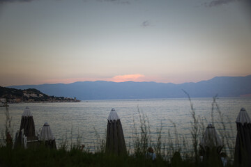 sunrise over the sea, clear sky without clouds. golden hour.	
