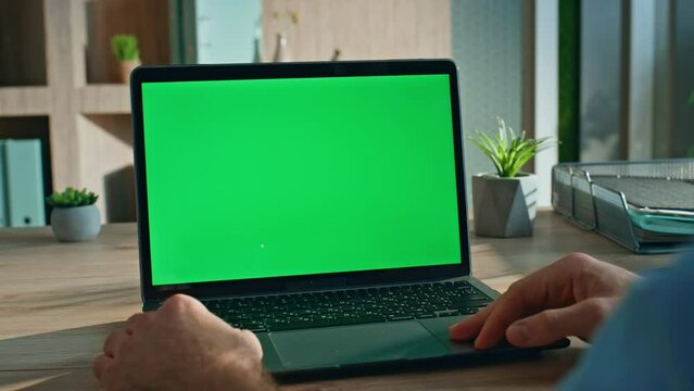 Manager talking mockup laptop having online interview at home office close up. 