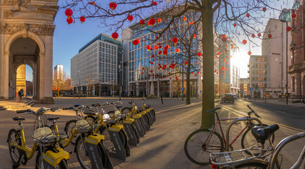 View of cycle hire, Chinese lanterns and Central Library in St. Peter's Square, Manchester, Lancashire, England