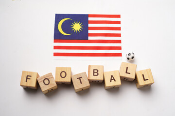 Malaysia flag with football title and white background. football concept