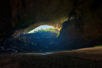 View towards the entrance of Hang En Cave, the first cave and camp site of Son Doong trek in Vietnam. The cave is in Phong Nha - Ke Bang National Park, UNESCO world heritage site.