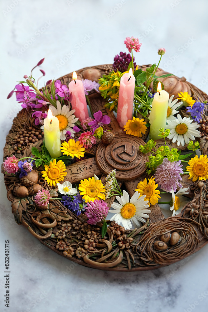 Wall mural altar for summer solstice, litha wiccan holiday. wheel of the year with colorful flowers and candles