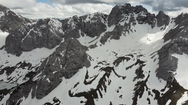 Aerial drone view of snow covered Alps in Ehrwald in Austria