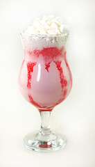 Delicious strawberry milkshake with whipped cream