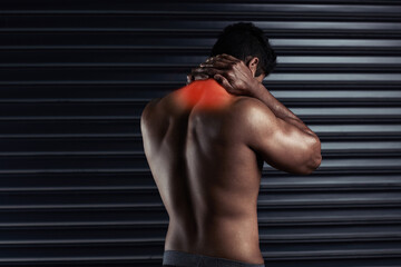 Back, xray and hands on neck with man by black background for injury, workout and accident in gym. Bodybuilder, athlete and wellness or anatomy for training, exercise and red fracture in studio