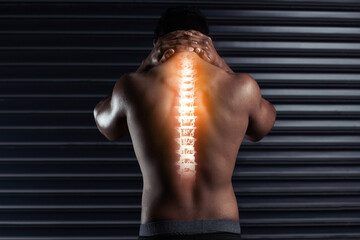 Back, xray and pain in spine with man by black background for injury, workout and accident in gym....