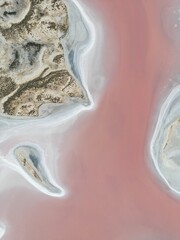 Stunning Aerial Shot of Lake Tyrrell: Vibrant Pink Waters and Salt Patterns