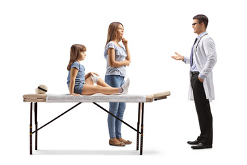 Obraz premium Mother and kid with a broken arm talking to a doctor, arm injury concept