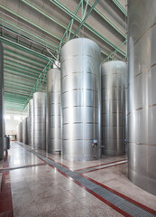 Wine storage tank in the red wine production workshop