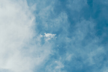 Colorful Beautiful blue sky with cloud formation background. white clouds soft focus. Large bright soft fluffy clouds are cover the entire blue sky. Cumulus clouds against blue sky.
