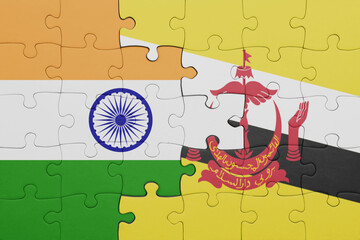 puzzle with the colourful national flag of brunei and flag of india.