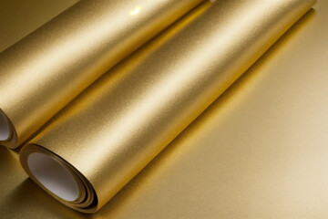 gold texture background metallic golden foil or shinny wrapping paper bright yellow wall paper for design