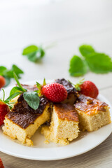 prepared cottage cheese casserole with fresh strawberries