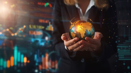 Fototapeta premium Businesswoman holds a glowing globe in a modern, high-tech environment, symbolizing global business, innovation, and leadership.