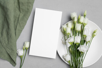 Wedding paper blank menu card mockup with eustoma flowers, mockup with copy space