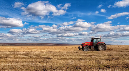 Obraz premium Tractor plowing the field Minimalistic Photo 