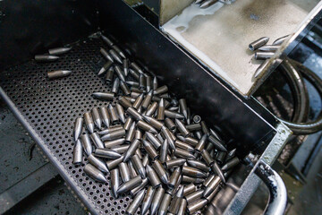 Bullet - important component of firearm ammunition.