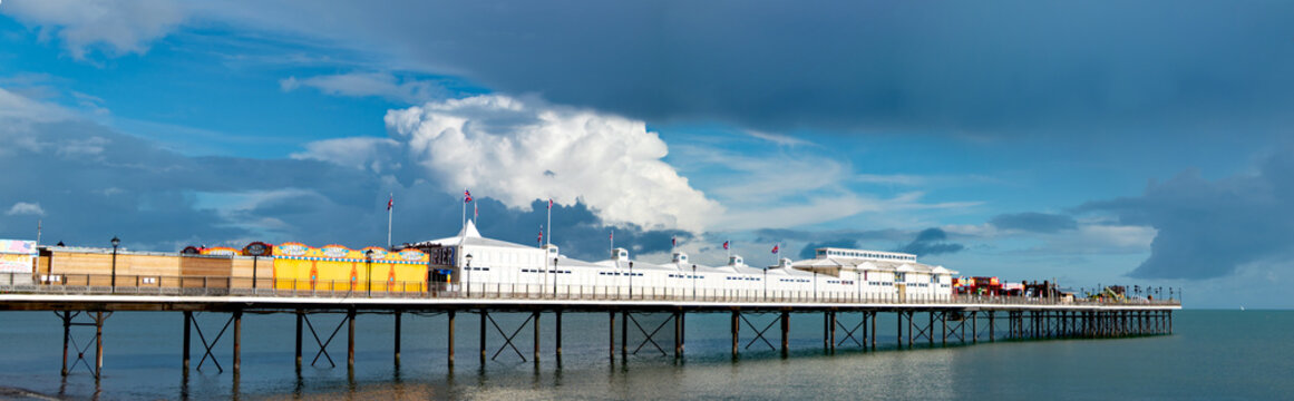Paignton, Devon, uk. 11-06-23. Paignton pier dramatic panorama in Torbay, Devon. Bright image with good copy space and editorial use. 