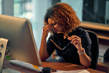 Businesswoman, burnout and working late night on computer for work deadline with eye strain....