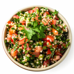 Closeup of Lebanese Tabouleh salad with parsley bulgur and tomatoes isolated on white background 