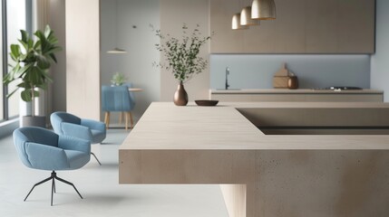 a minimalist kitchen with beige concrete countertops and soft blue accent chairs