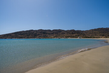 Panoramic view of the beautiful  turquoise Manganari beach in Ios Greece