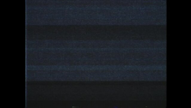 Effect VHS. A television screen with VHS effect of digital pixelated noise, displaying a 4x3 image. VHS digital pixelated noise effect.