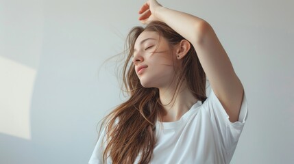 Fototapeta premium Portrait photo of Asian model, white shirt, long golden brown hair, in her early 20s.