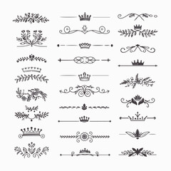 A collection of ornate design elements, primarily in the form of decorative dividers or borders. These designs are symmetrical and feature a mix of floral and crown motifs. They are positioned horizon