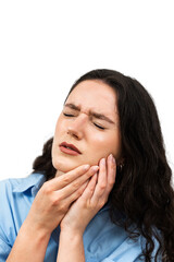 Fototapeta premium Suffering Young Woman With Painful Toothache On White Background. Attractive Girl with Toothache Touches Her Cheek And Feel Pain in Her Teeth. Acute Toothache. Tooth Ache Before Visit Dentist