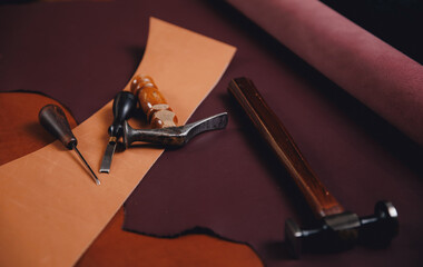 Banner shoemaker, Concept background tailor shoes maker from skin. Natural leather brown color with tools, top view