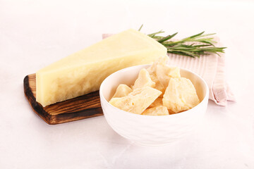 Chopped Italian hard parmesan cheese