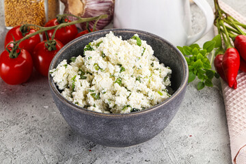 Curd cheese with green herbs