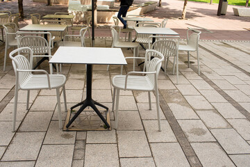 Restaurant outdoor terrace in city centre.Summer season. High quality photo