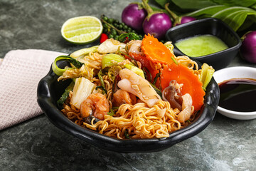 Asian cuisine - Fried noodles with seafood