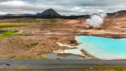 Aerial view of Blue lake made from water coming out of geothermal power plant from above, Iceland