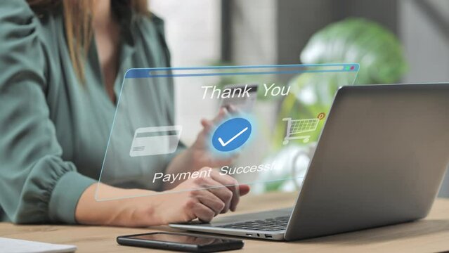 female at laptop computer holding credit card makes online payment,young woman sits at the desk at home shopping on internet retail store,virtual screen purchase,graphic display visualization