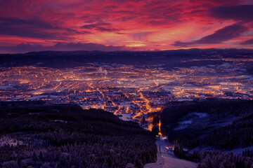 Liberec town in night, Czech Republic landscape, winter mountain forest before sunrise. Czech early...