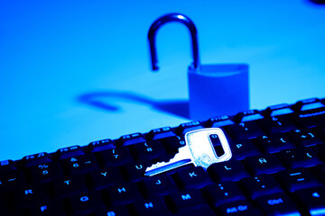 A credit card with a padlock with a key, security in online shopping, with copy space
