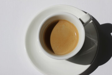 Freshly Brewed Espresso with Crema. Cup of Fresh Aromatic Coffee.