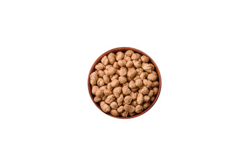 Dry soybean meat pellets, diet food for vegan and vegetarian cuisine