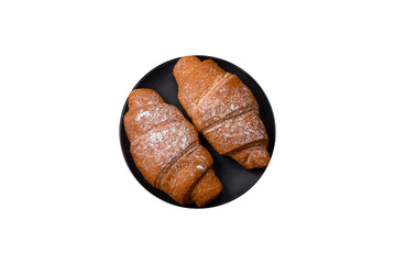 Delicious crispy golden croissant with chocolate filling