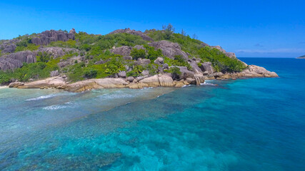 Grand Sister Island close to La Digue, Seychelles. Aerial view of tropical coastline on a sunny day