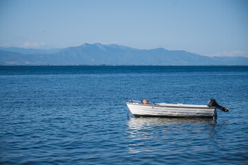 A boat on a calm sea on a summer day