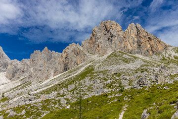 Dolomites beautiful mountain landscape on a sunny day. Hiking in the Alps in Italy, South Tirol mountain range of Alpi Dolomiti di Sesto near Cortina di Amprezzo and Tre Cime di Lavaredo alpine scene