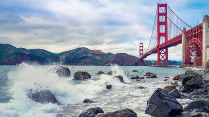 View from the beach on the famous Golden Gate Bridge in the early evening, San Francisco, USA